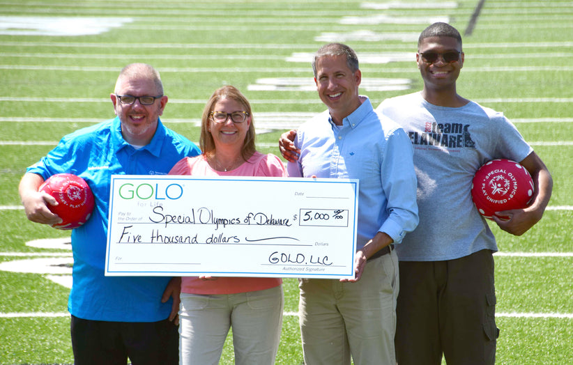 GOLO Jennifer Brooks making donation to Special Olympics of Delaware