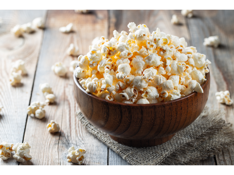 Bowl of air-popped popcorn on a nice wooden table